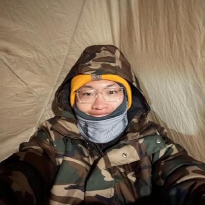 Me in a tent on Kilimanjaro